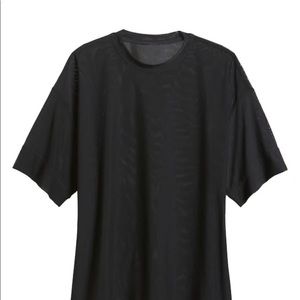 Mesh breathable top, hardly worn. Oversized :)